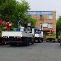 Автотехника на таможенной площадке у здания МПТИ